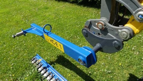 mini digger hedge cutter attachment